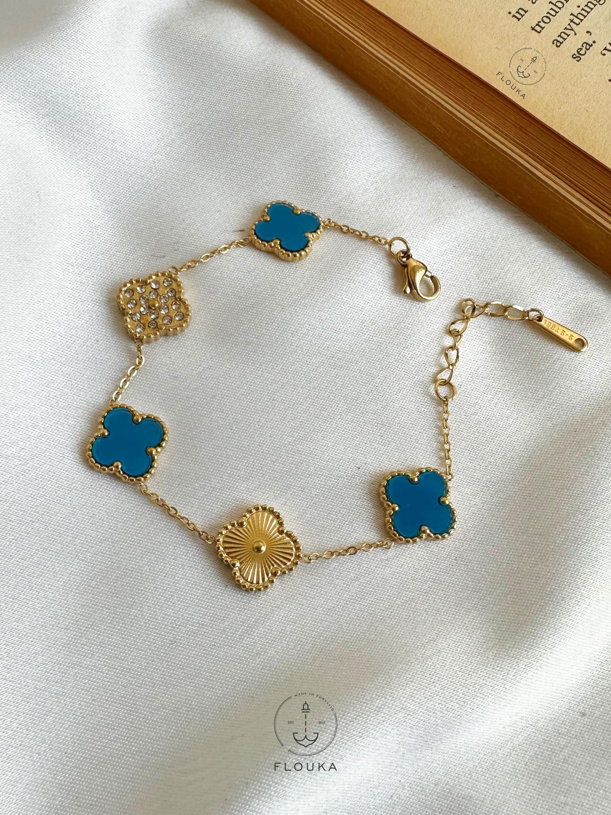 1702491101_B0030-2.jpg baby blue vancleef bracele