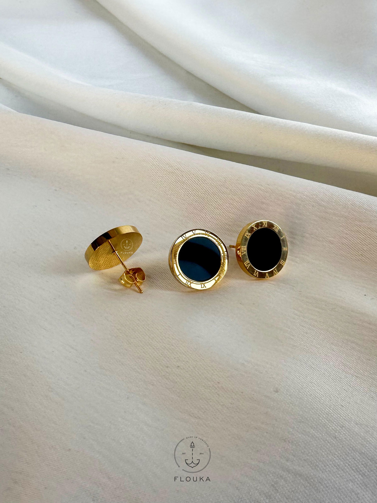 1702492363_E0003.jpg black bulgari earring