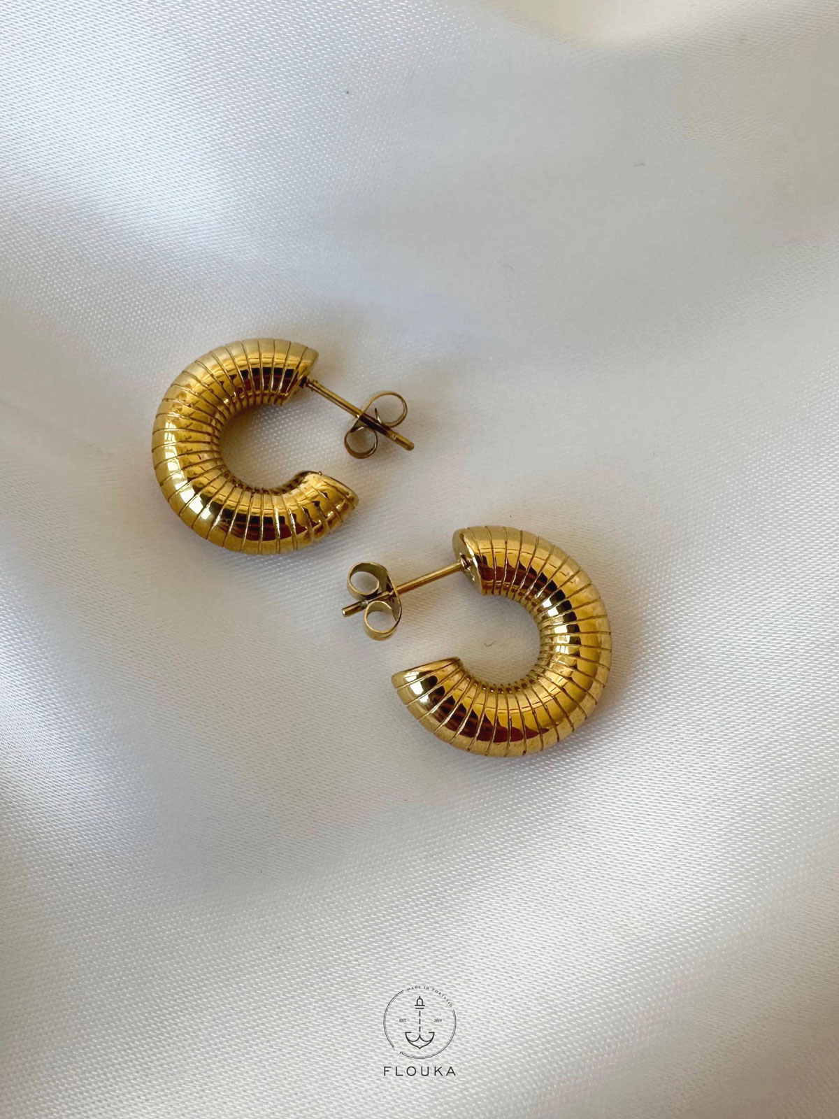 1708629340_E0136.jpg circle zibra earrings