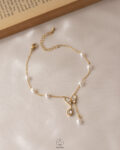 white butterfly anklet