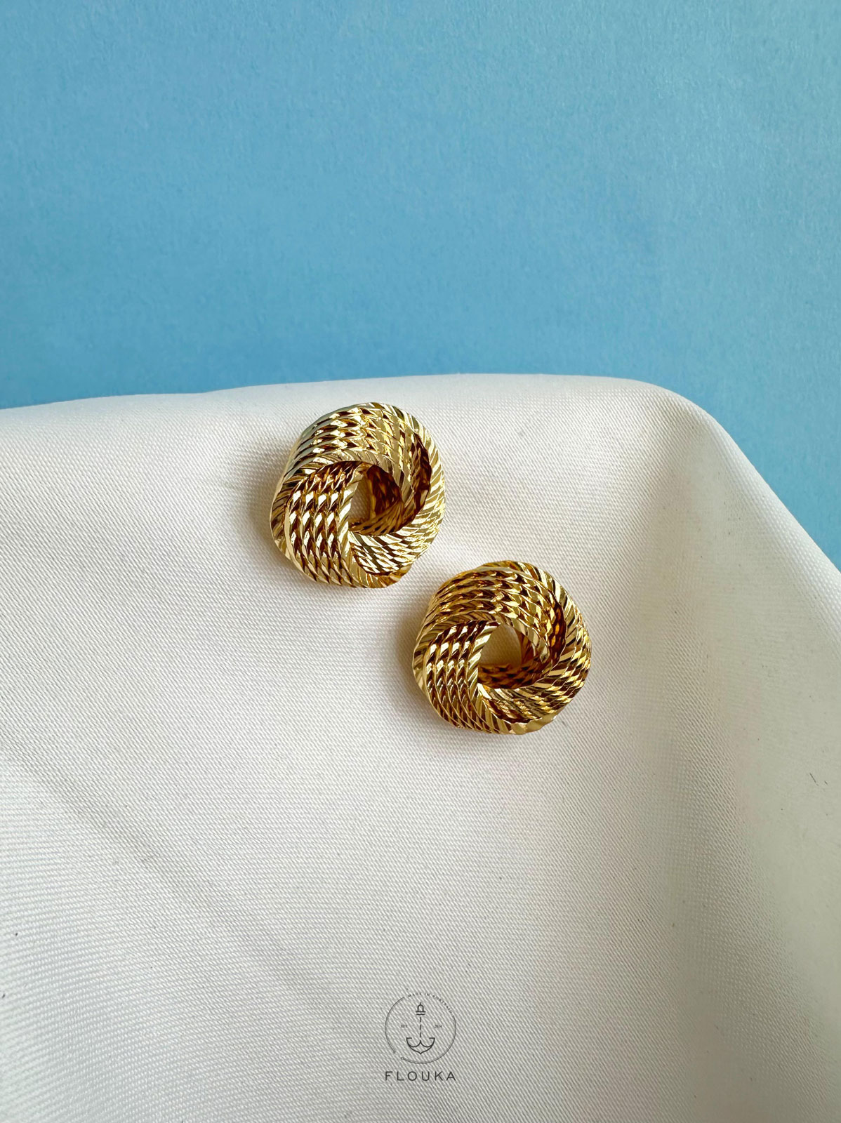 1714365974_e0202.jpg tie gold plated earrings