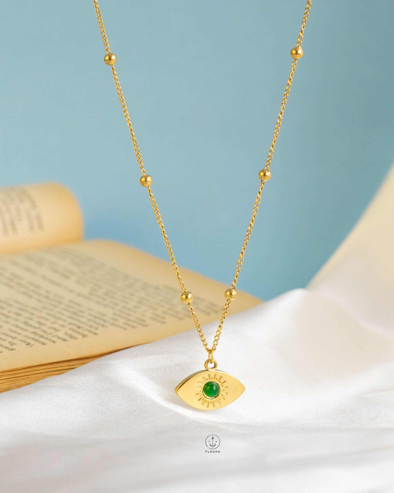 1720348691_n0488.jpg green eye gold necklace