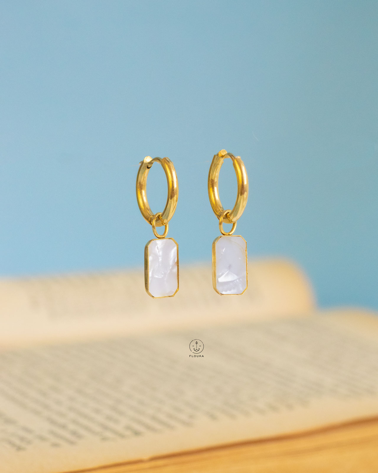 1720651186_e0335.jpg tree branch gold earrings