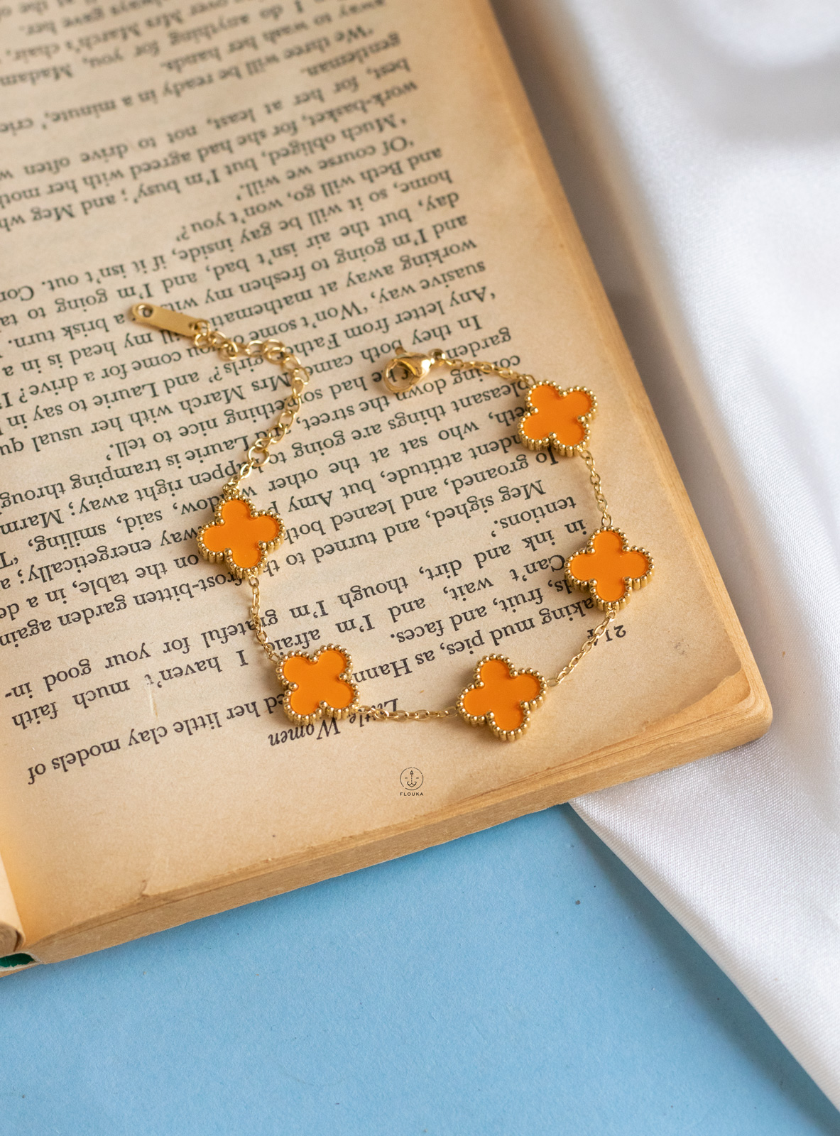 1722023027_b0231.jpg gold orange vancleef bracelet