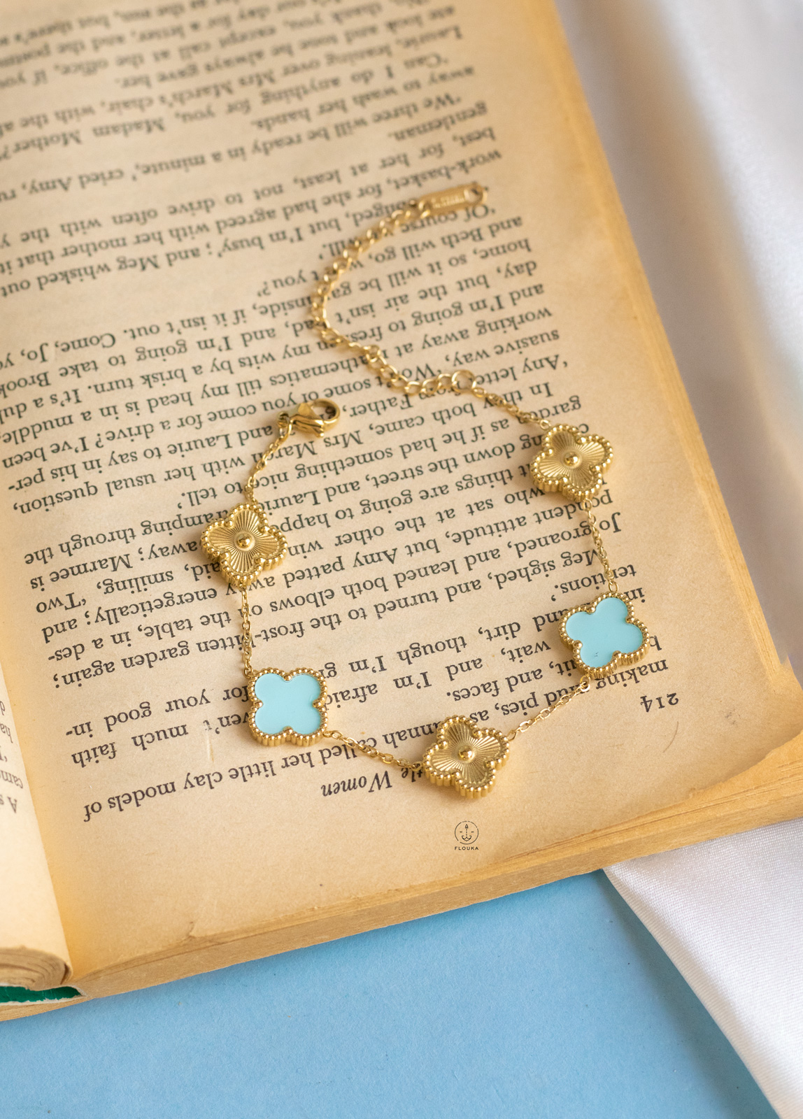 1722023071_b0229.jpg baby blue & gold vancleef bracelet