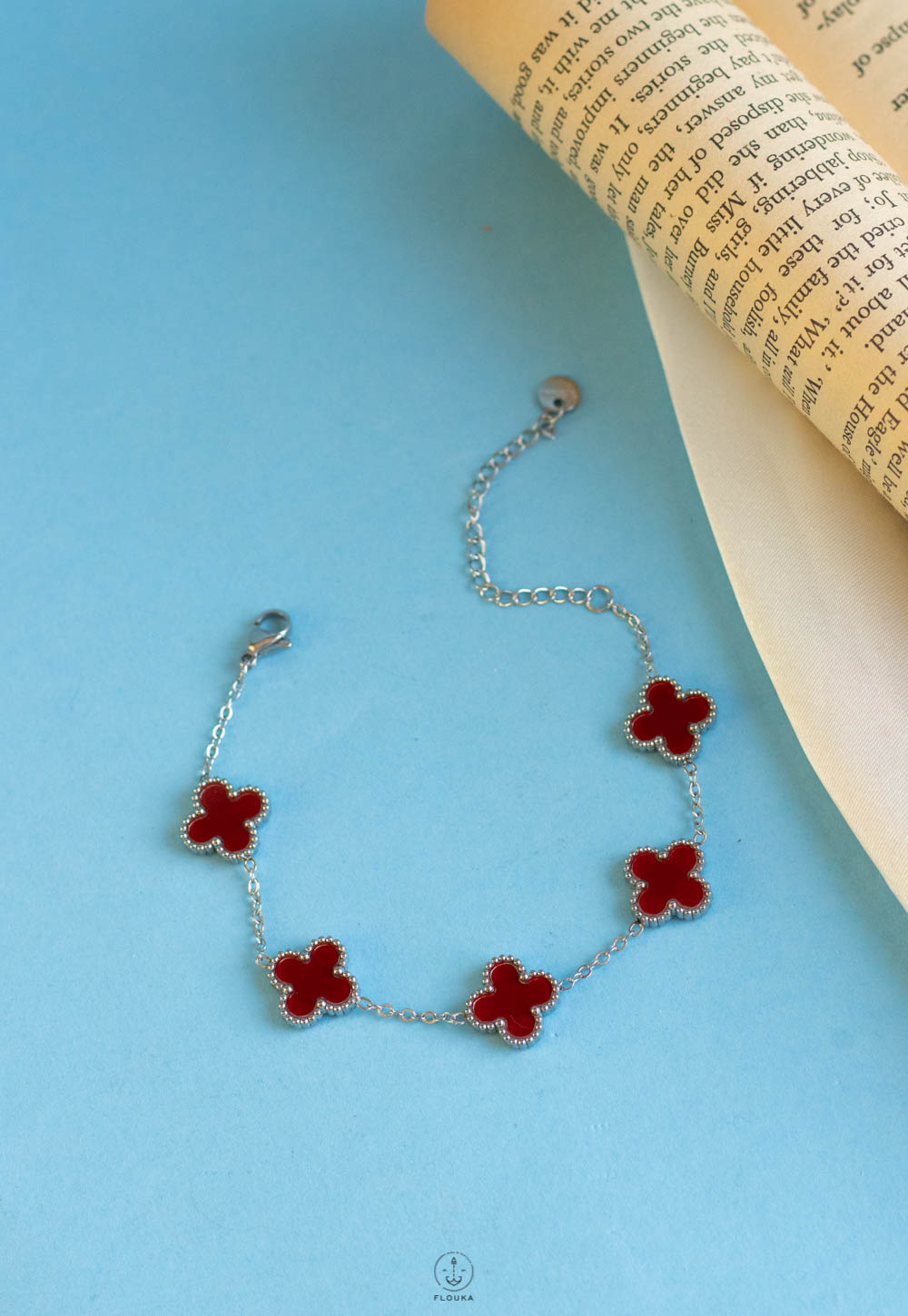 1723349276_b0272.jpg silver dark red vancleef bracelet