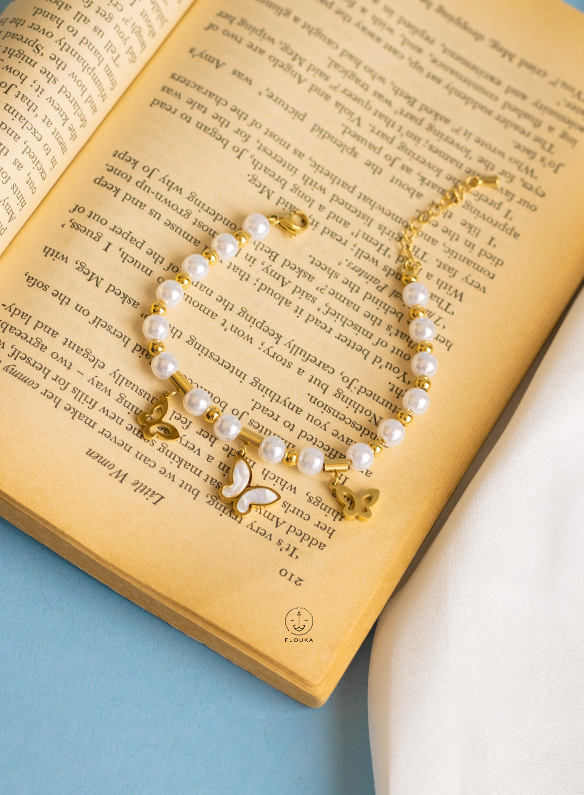 1723349906_b0238.jpg fake pearl butterfly bracelet