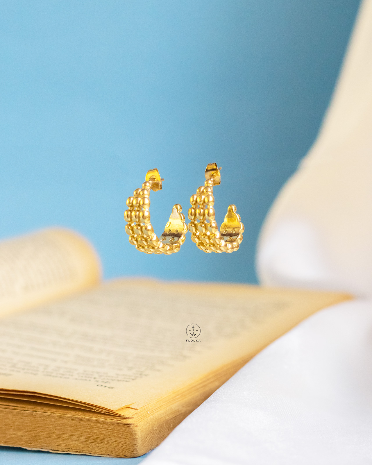1723372172_e0371.jpg gold net earrings