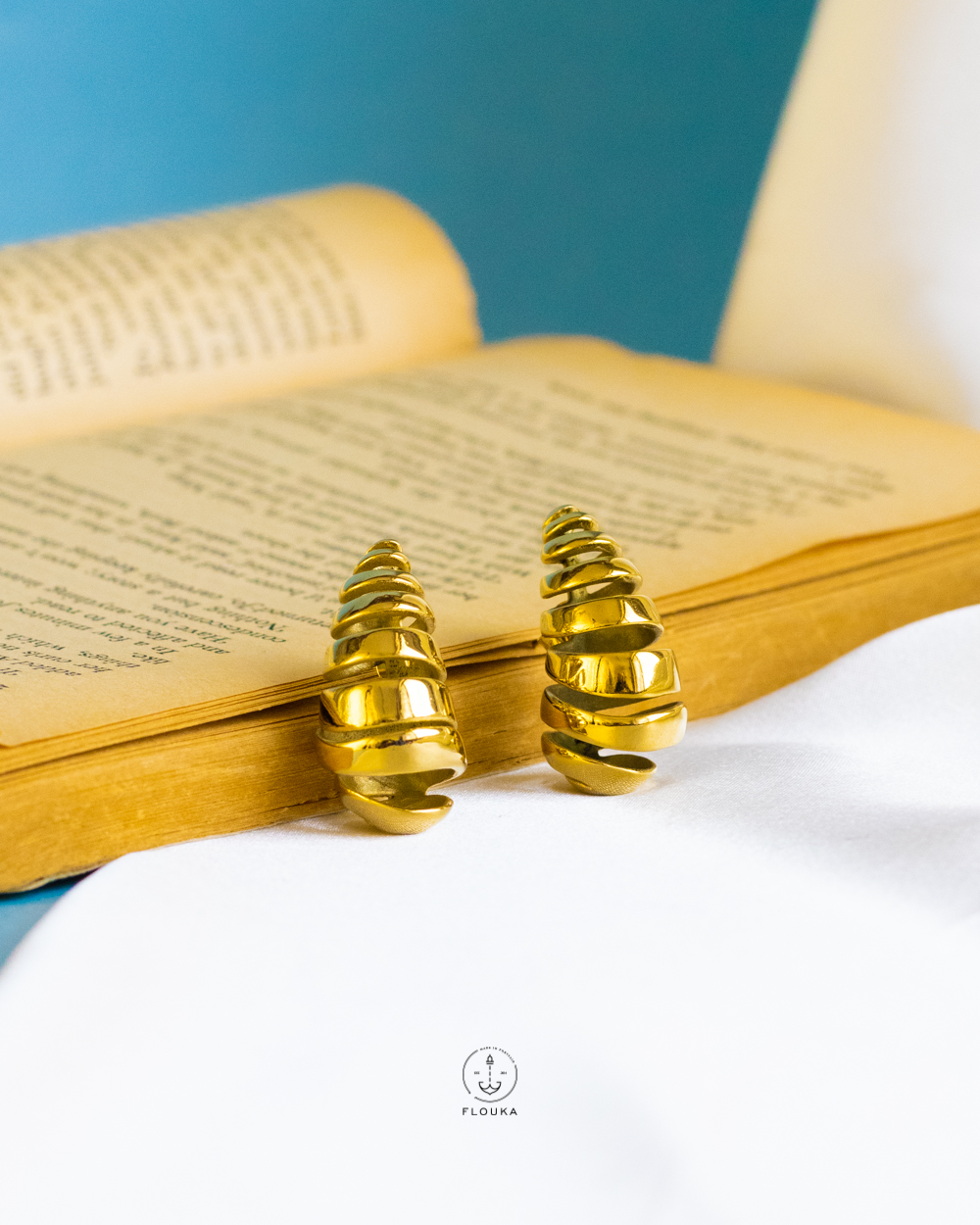 1724169915_e0390.jpg empty storm gold earrings
