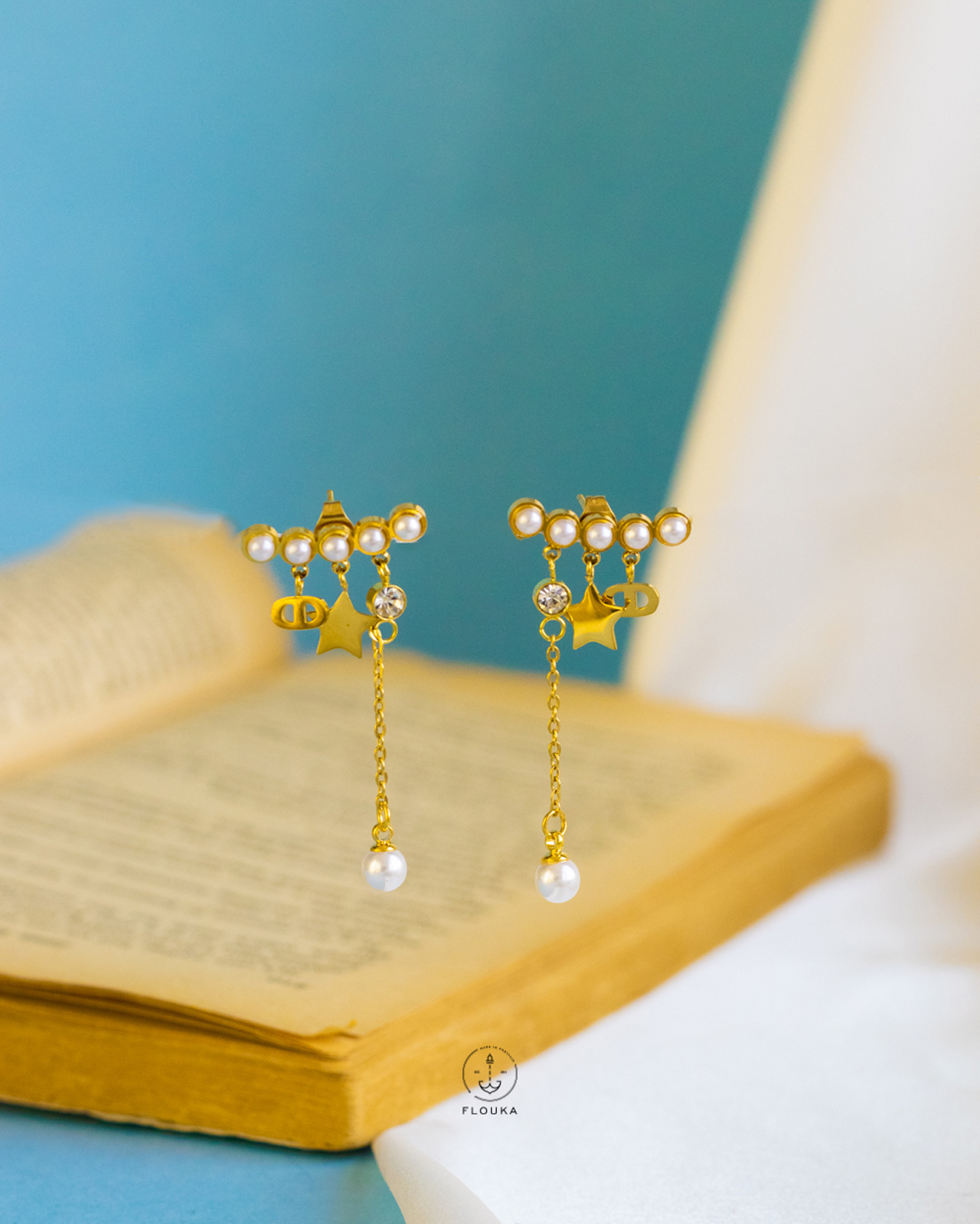 1724170297_e0386.jpg star straus gold earrings