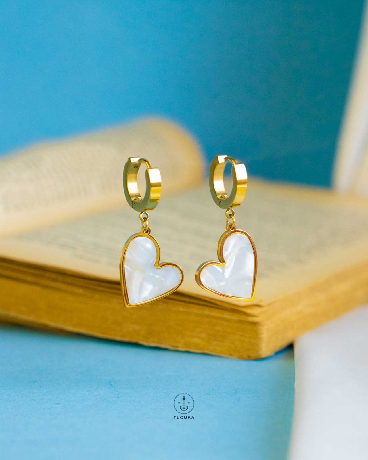1724171150_e0385.jpg white heart takka earrings