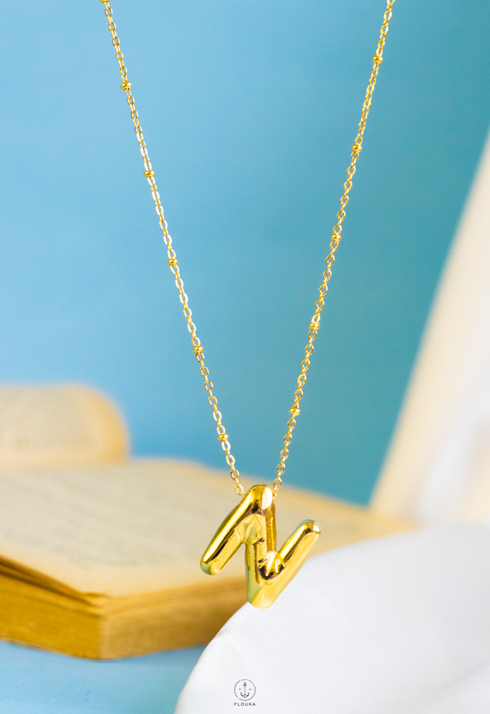 1724172930_n0655.jpg gold helium letter N necklace