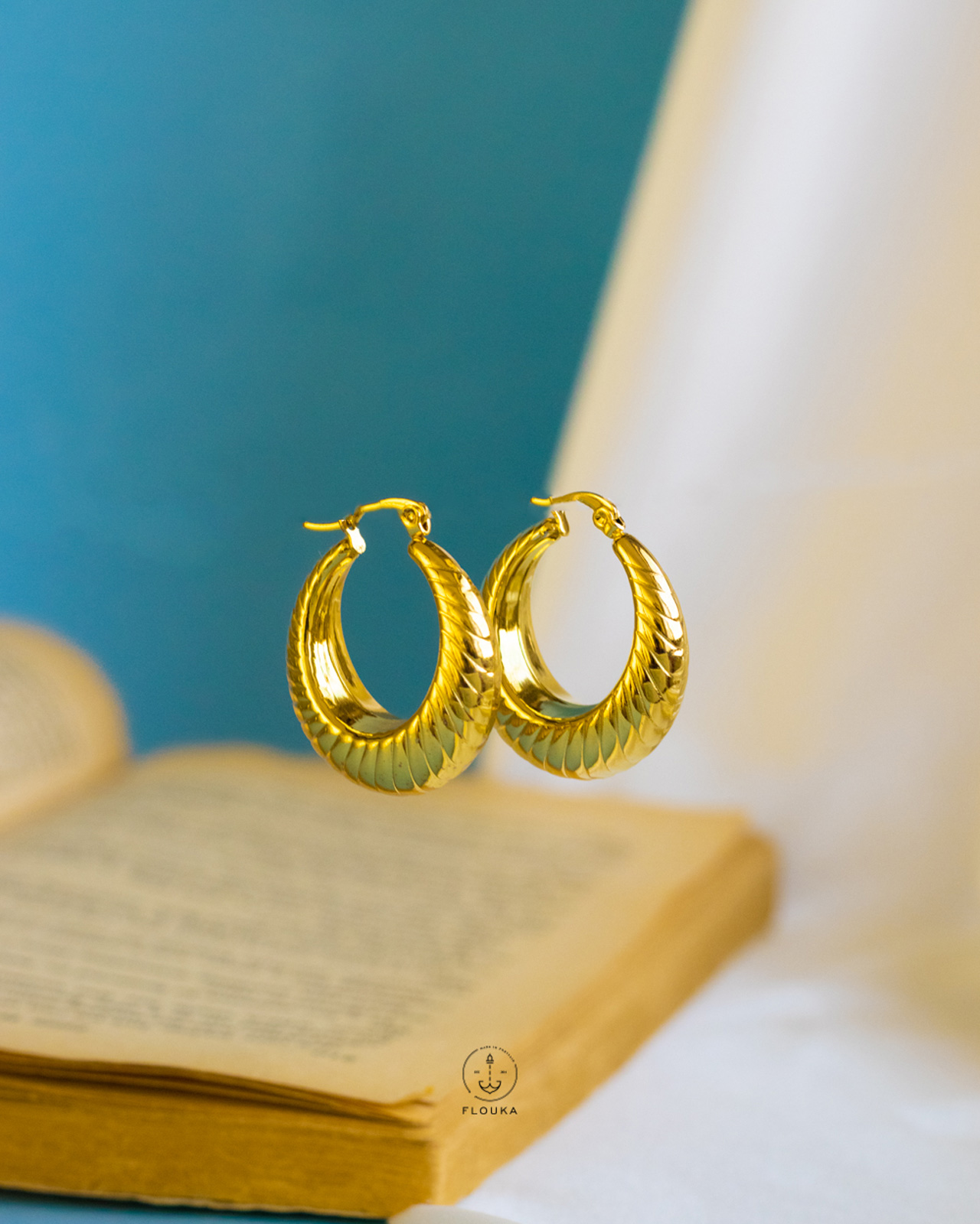 1724228079_e0399.jpg gold tire earrings