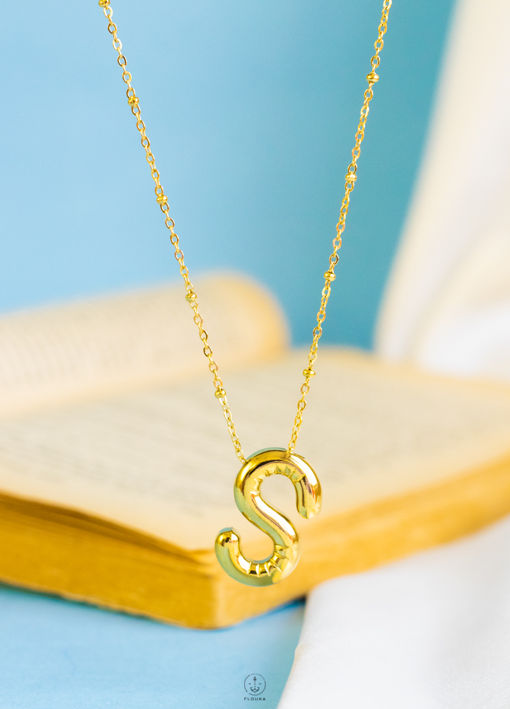 1724237466_n0662.jpg gold helium letter S necklace