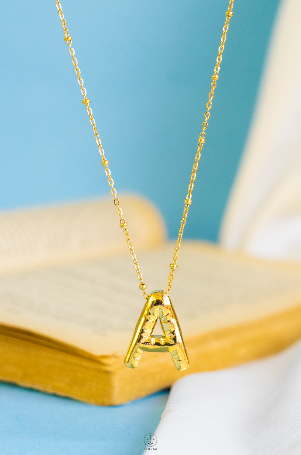 1724237586_n0660.jpg gold helium letter A necklace