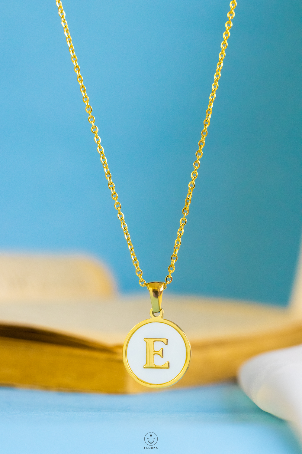 1724252928_n0680.jpg white letter E necklace