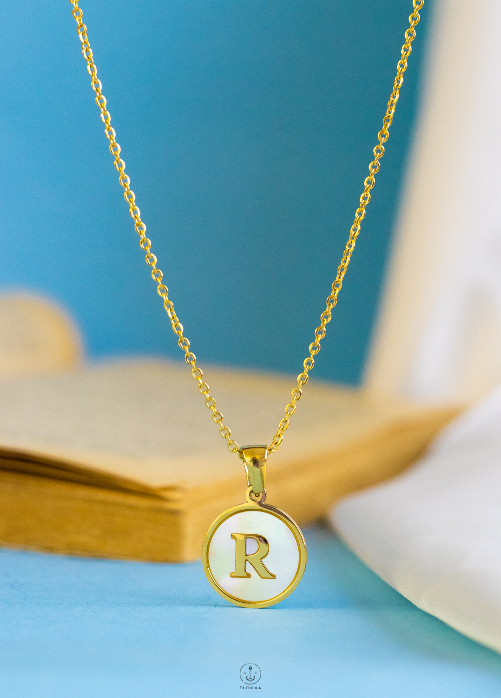 1724254020_n0682.jpg white letter R necklace