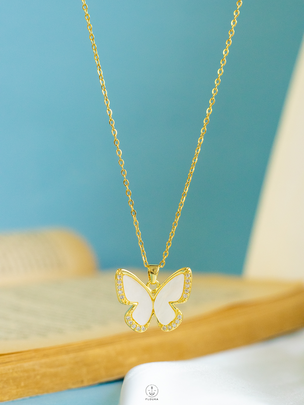 1725705260_n0714.jpg gold white butterfly straus necklace