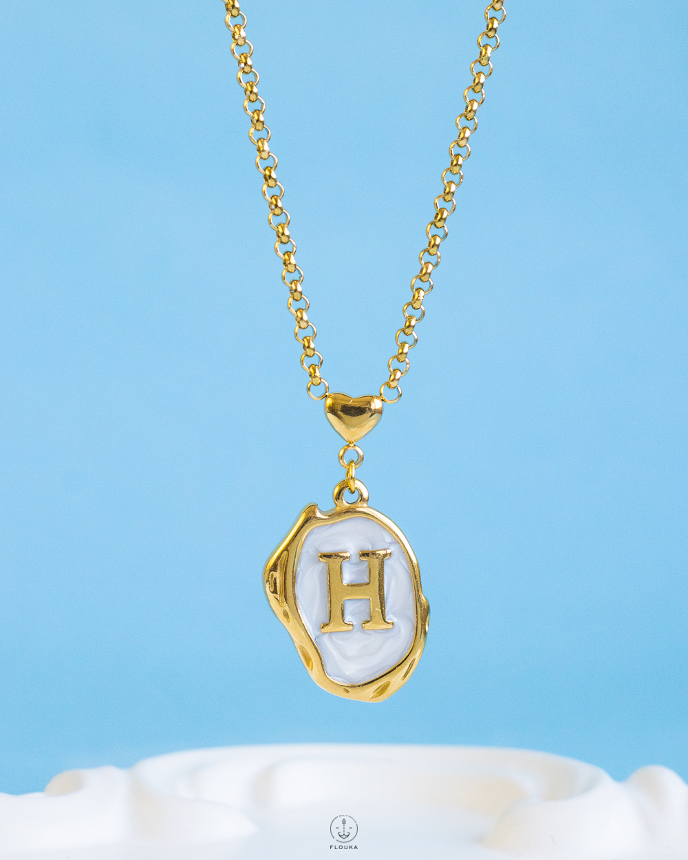 1731242583_N0974.jpg white Resin letter H necklace