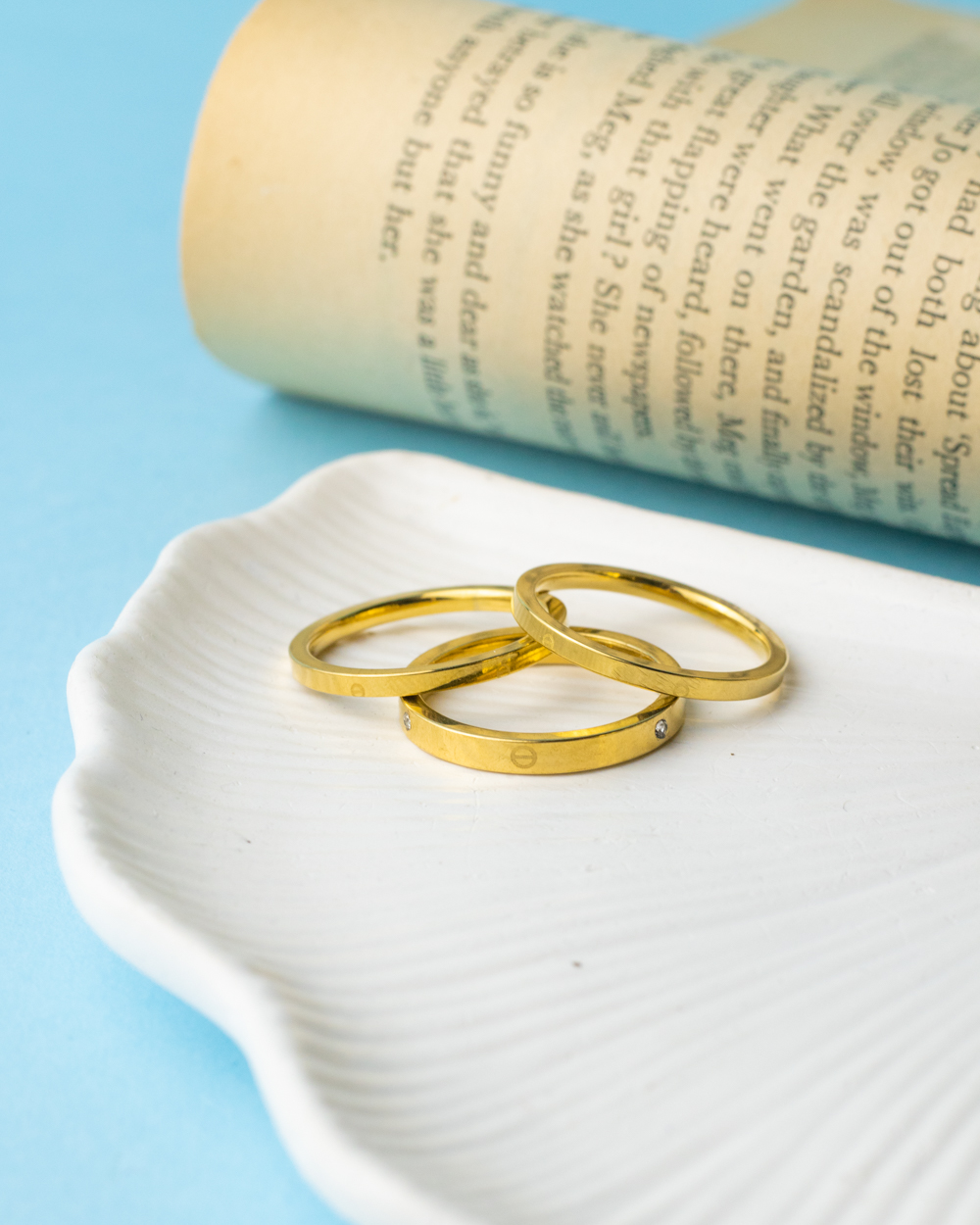 1732797175_r0459.jpg gold triple cartier rings