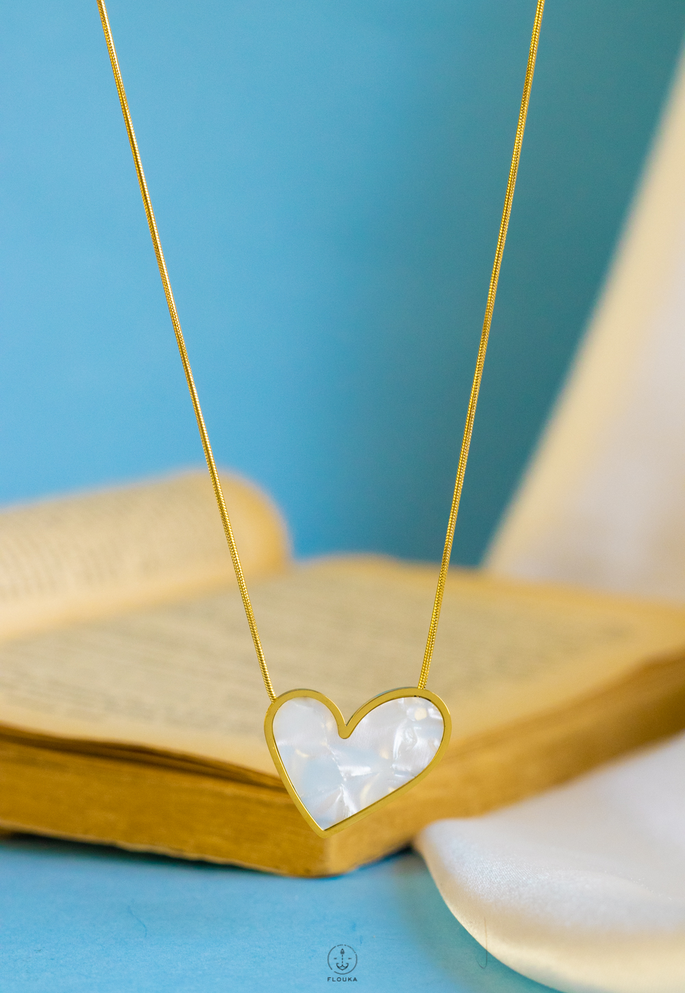 1736187025_n0669.jpg wide white heart gold necklace