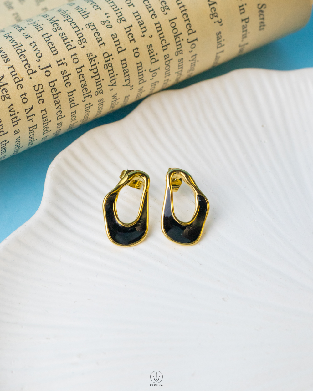 1737229264_e0467.jpg black crazy hole earrrings