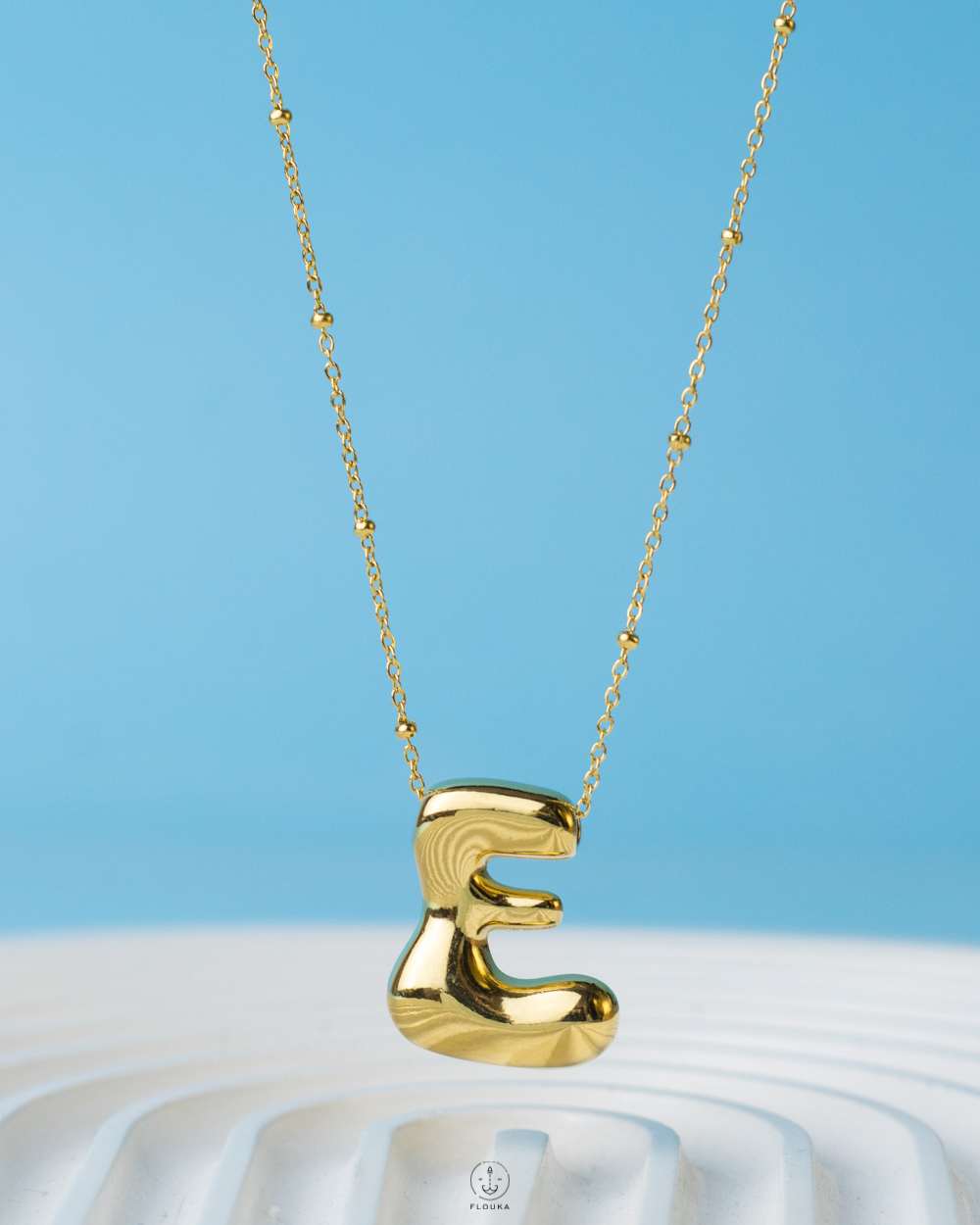 1736449558_N628-NEW.jpg curvy letter E necklace