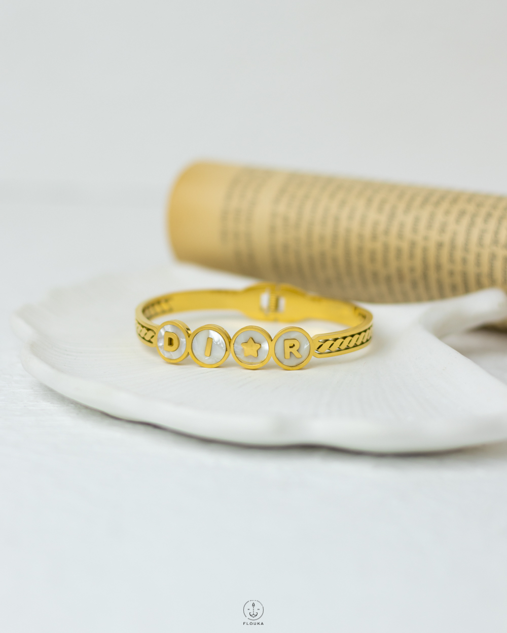 1738745385_o0449.jpg white dior gold bracelet