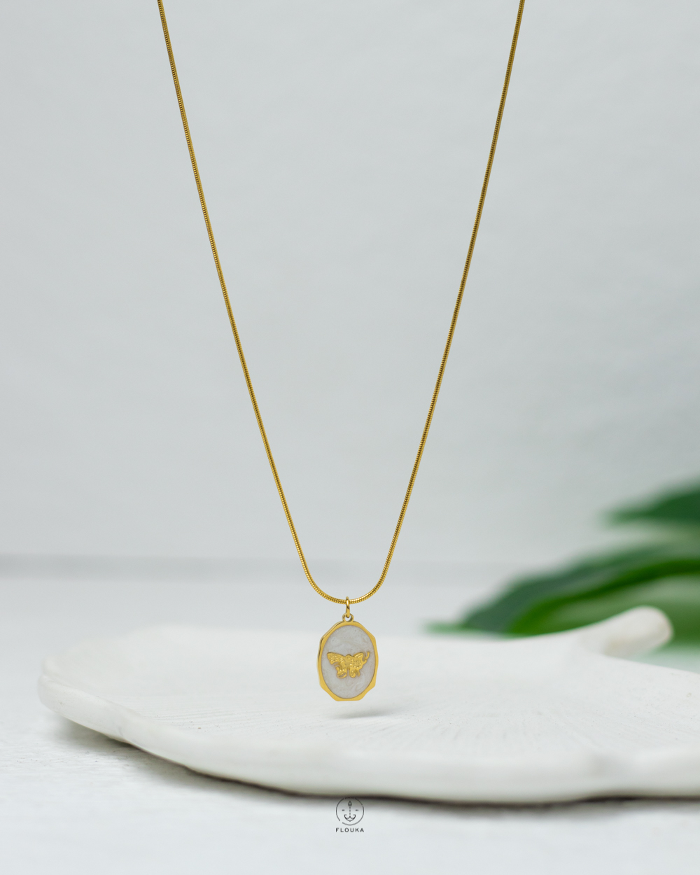 1738882509_n1145.jpg white butterfly gold necklace