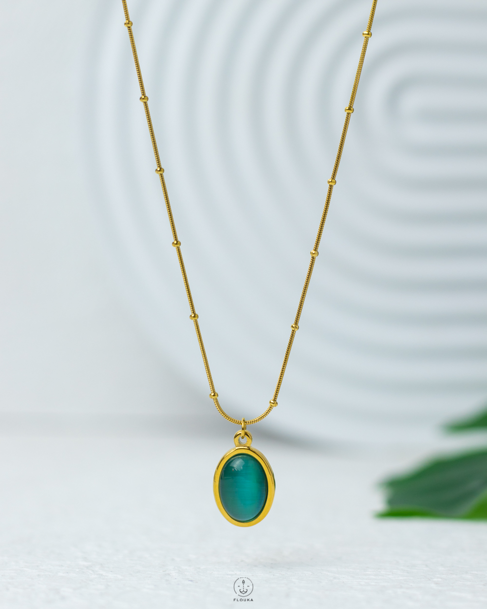 1740070471_n1214.jpg blue cat eye gold necklace