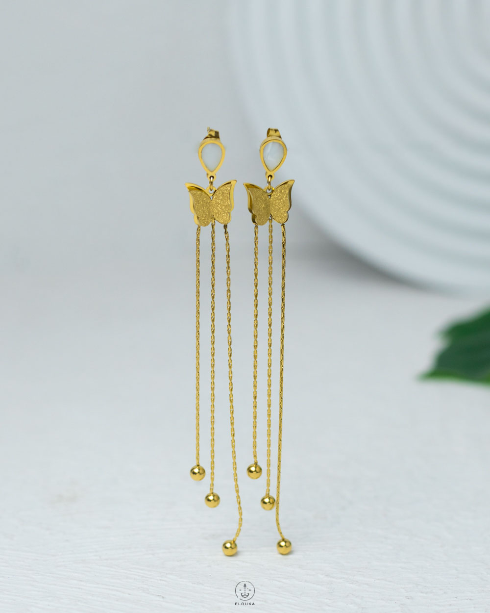 1740817558_e0519.jpg white butterfly earrings