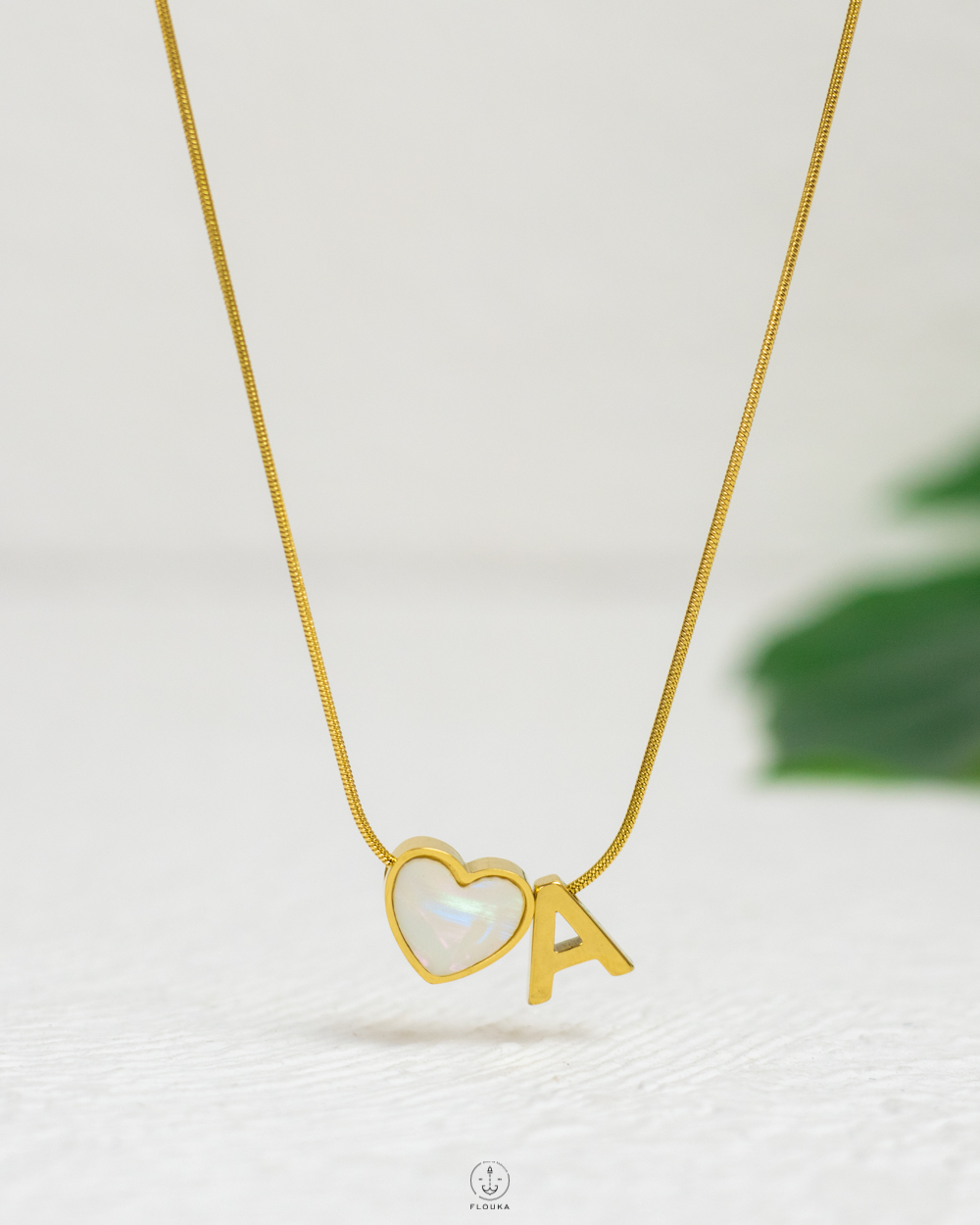1742759885_N1273.jpg thin white heart letter A necklace