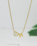 thin white heart letter H necklace