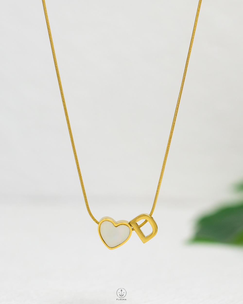 1742760220_N1280.jpg thin white heart letter D necklace