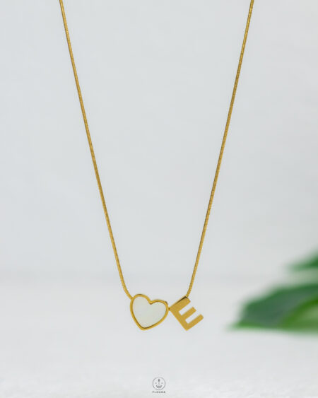 thin white heart letter E necklace