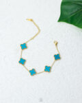gold blue vancleef bracelet