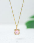 pink straus gold necklace
