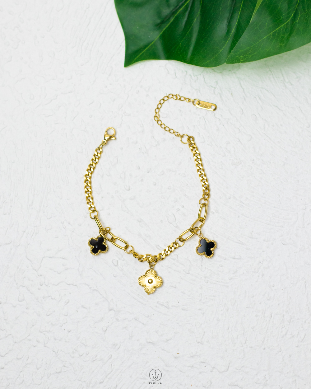 1744662917_b0686.jpg black & gold vancleef bracelet