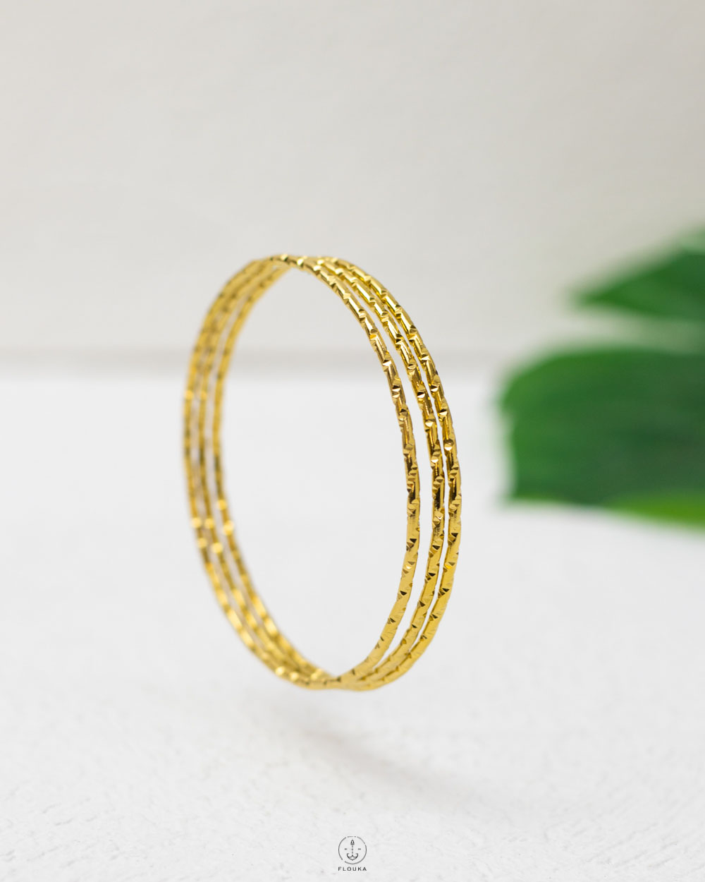 1745080660_o0586.jpg triple gold bracelet