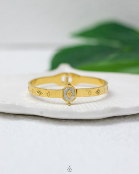 white straus gold bracelet