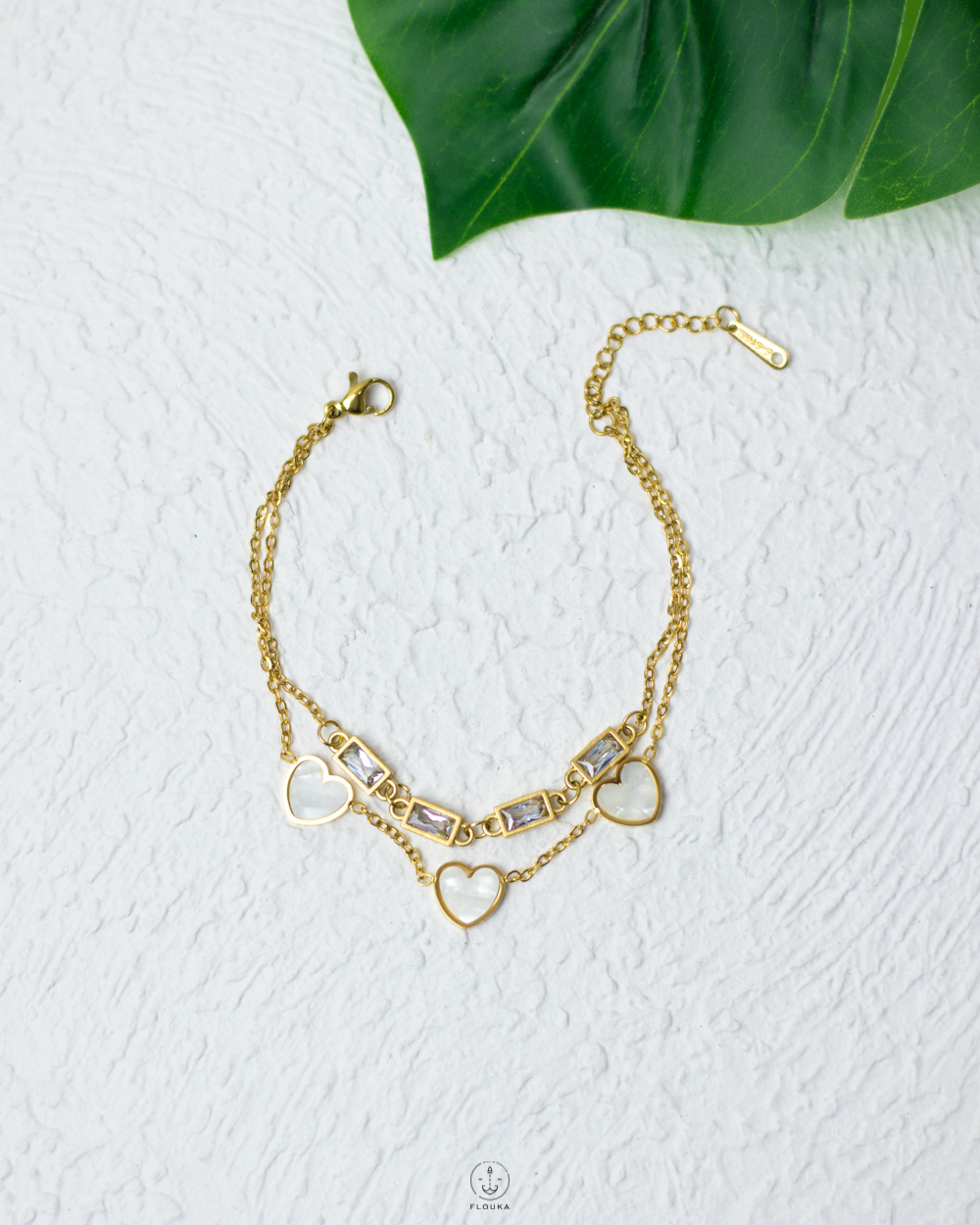 1745170762_b0721.jpg white heart gold bracelet