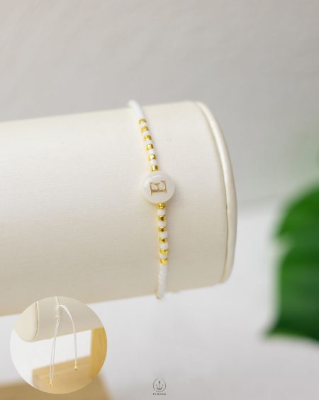 white letter ( e ) hand made bracelet