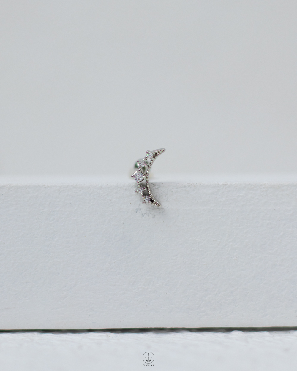 1746305730_c0077.jpg sliver strus piercing