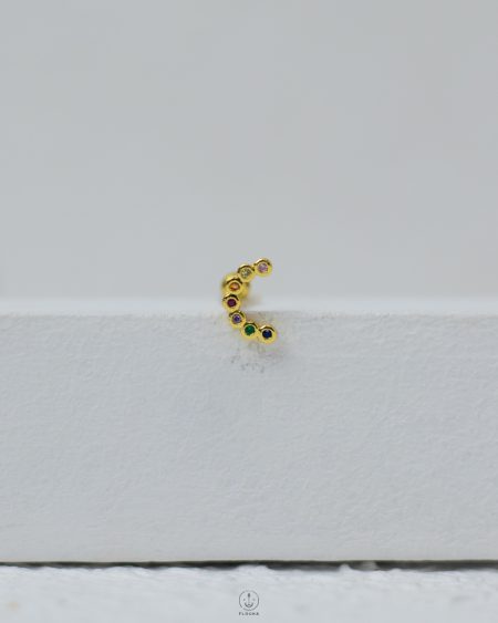 gold many color strus piercing