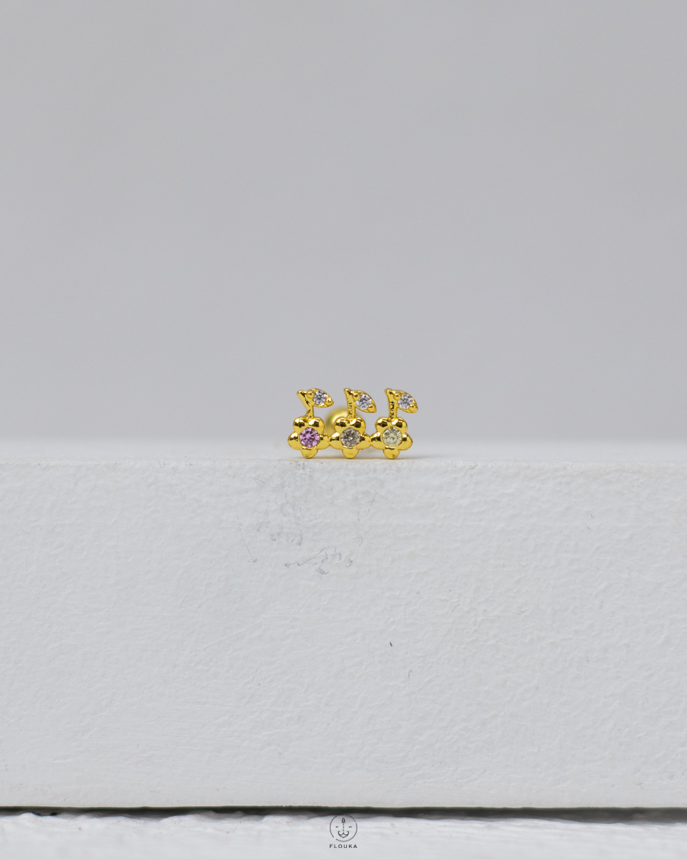 1746633708_c0105.jpg gold strus piercing