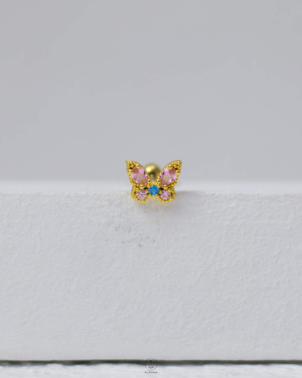 1746634128_c0098.jpg pink butterfly piercing