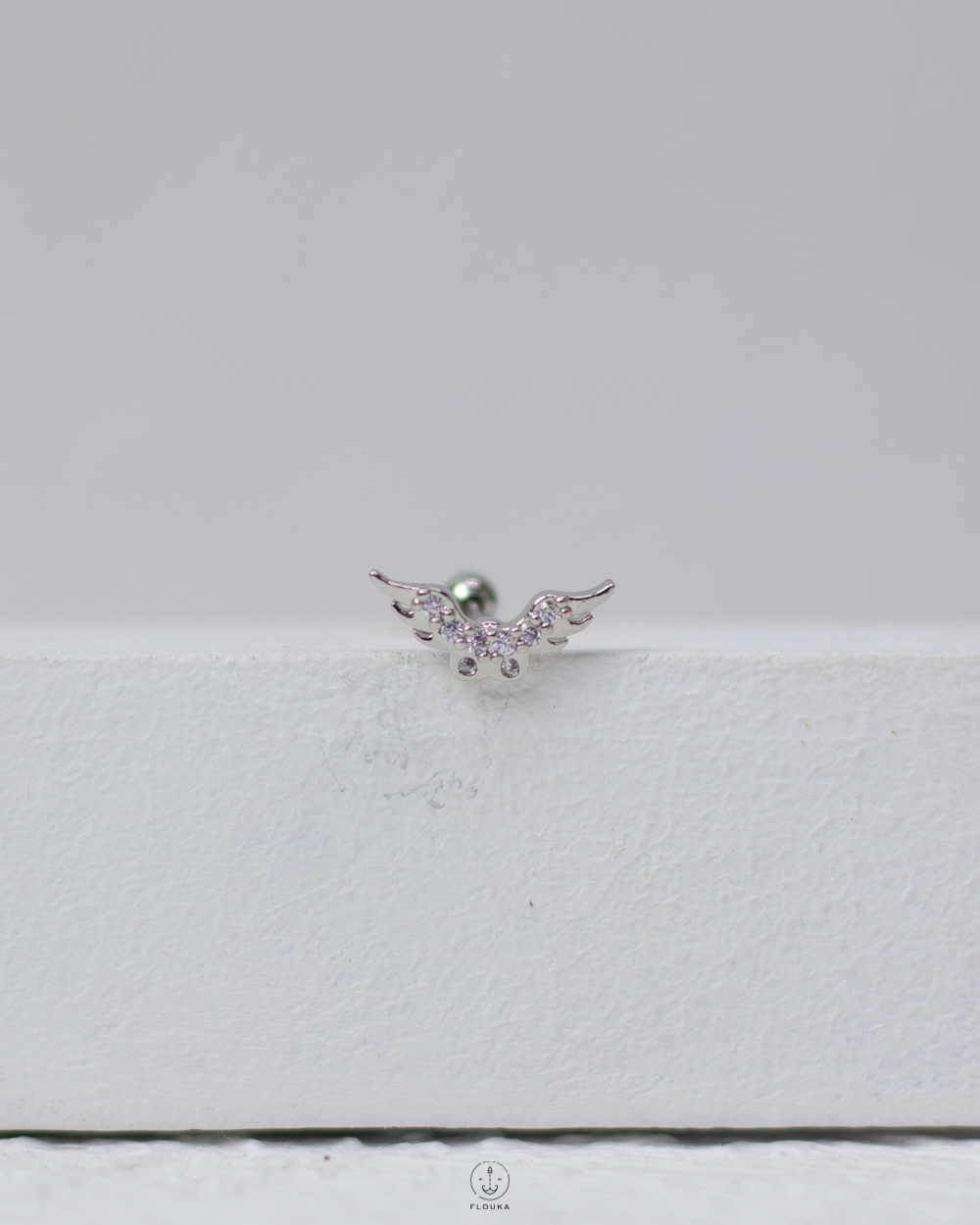 1746634241_c0109.jpg sliver strus angel piercing