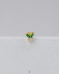 green butterfly piercing