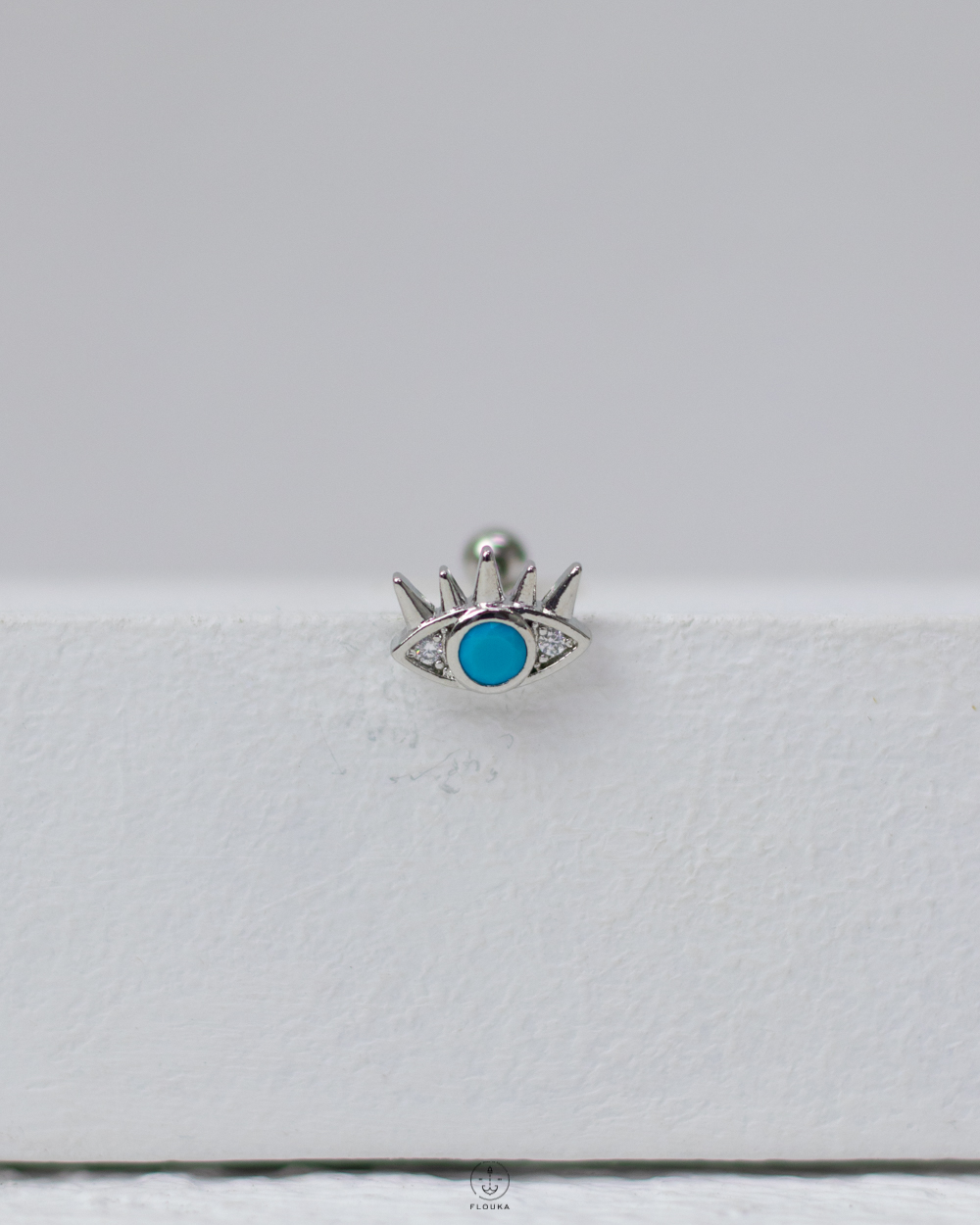 1746637118_c0108.jpg silver blue eye piercing