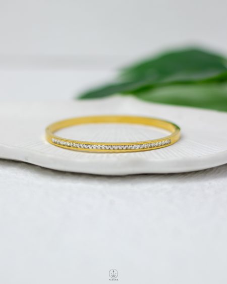 white straus gold bracelet